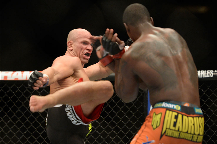 VANCOUVER, BC - JUNE 14: (L-R) Ryan Jimmo kicks Ovince Saint Preux during the UFC 174 event at Rogers Arena on June 14, 2014 in Vancouver, British Columbia, Canada. (Photo by Jeff Bottari/Zuffa LLC/Zuffa LLC via Getty Images)