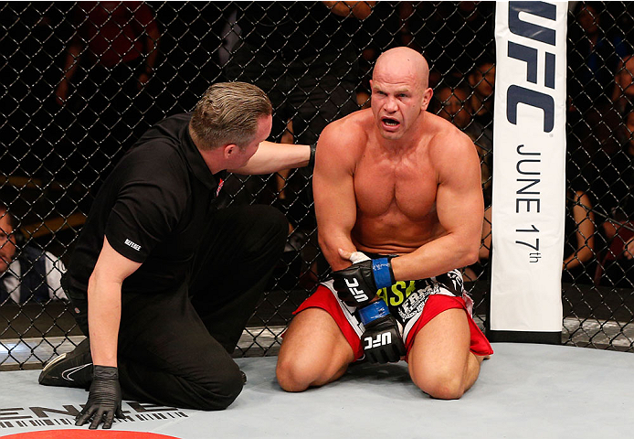 VANCOUVER, BC - JUNE 14: Ryan Jimmo clutches his arm in pain after his submission loss to Ovince Saint Preux in their light heavyweight bout at Rogers Arena on June 14, 2014 in Vancouver, Canada. (Photo by Josh Hedges/Zuffa LLC/Zuffa LLC via Getty Image