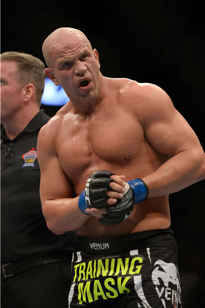 VANCOUVER, BC - JUNE 14: Ryan Jimmo holds his arm after submitting verbally after his arm was injured against Ovince Saint Preux during the UFC 174 event at Rogers Arena on June 14, 2014 in Vancouver, British Columbia, Canada. (Photo by Jeff Bottari/Zuff