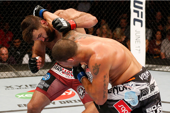 VANCOUVER, BC - JUNE 14: (R-L) Brendan Schaub punches Andrei Arlovski in their heavyweight bout at Rogers Arena on June 14, 2014 in Vancouver, Canada. (Photo by Josh Hedges/Zuffa LLC/Zuffa LLC via Getty Images)