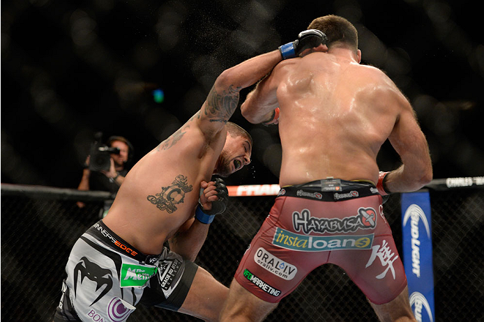 VANCOUVER, BC - JUNE 14: (L-R) Brendan Schaub punches Andrei Arlovski during the UFC 174 event at Rogers Arena on June 14, 2014 in Vancouver, British Columbia, Canada. (Photo by Jeff Bottari/Zuffa LLC/Zuffa LLC via Getty Images)