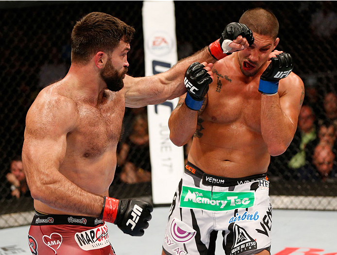 VANCOUVER, BC - JUNE 14: (L-R) Andrei Arlovski punches Brendan Schaub in their heavyweight bout at Rogers Arena on June 14, 2014 in Vancouver, Canada. (Photo by Josh Hedges/Zuffa LLC/Zuffa LLC via Getty Images)