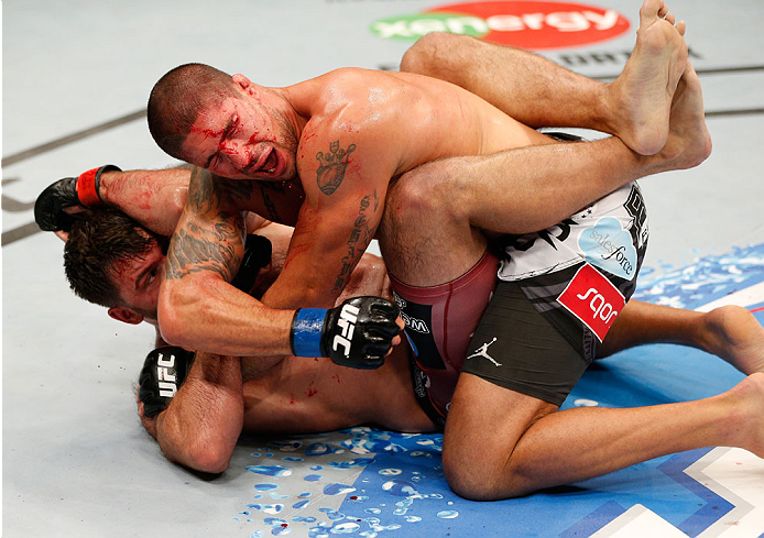 VANCOUVER, BC - JUNE 14: (R-L) Brendan Schaub follows through on an elbow strike against Andrei Arlovski in their heavyweight bout at Rogers Arena on June 14, 2014 in Vancouver, Canada. (Photo by Josh Hedges/Zuffa LLC/Zuffa LLC via Getty Images)
