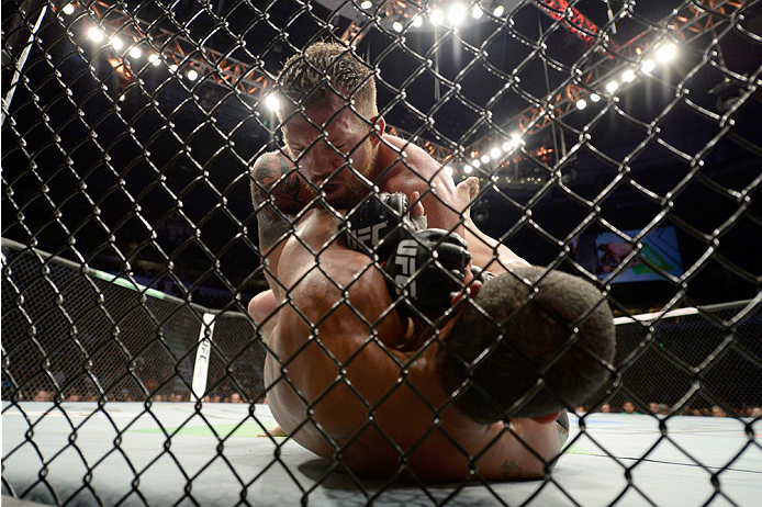 VANCOUVER, BC - JUNE 14: (L-R) Ryan Bader controls the body of Rafael Cavalcante during the UFC 174 event at Rogers Arena on June 14, 2014 in Vancouver, British Columbia, Canada. (Photo by Jeff Bottari/Zuffa LLC/Zuffa LLC via Getty Images)