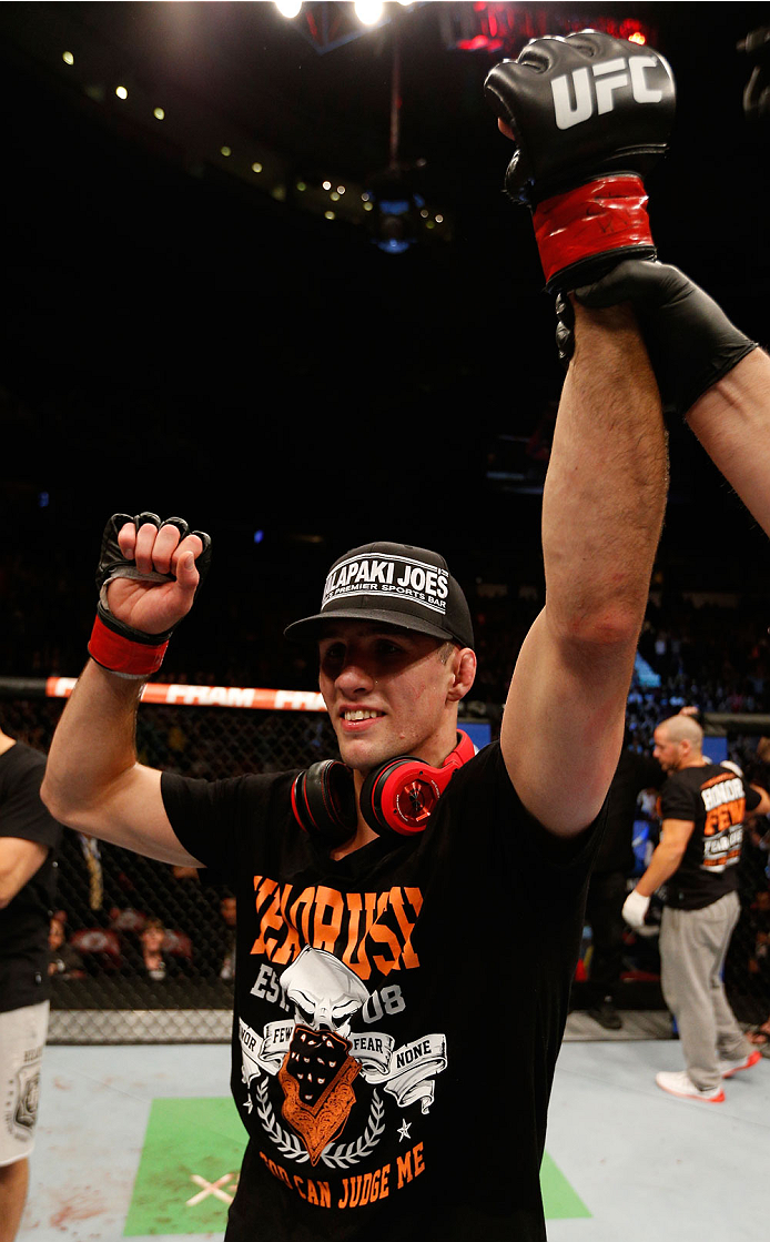 VANCOUVER, BC - JUNE 14: Rory MacDonald reacts after defeating Tyron Woodley in their welterweight bout at Rogers Arena on June 14, 2014 in Vancouver, Canada. (Photo by Josh Hedges/Zuffa LLC/Zuffa LLC via Getty Images)
