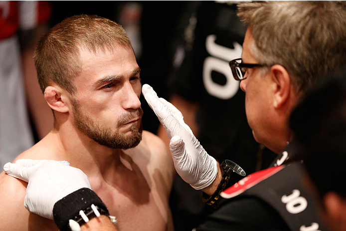 VANCOUVER, BC - JUNE 14: UFC flyweight challenger Ali Bagauitinov prepares to enter the Octagon before facing UFC Flyweight Champion Demetrious 'Mighty Mouse' Johnson in their UFC flyweight championship bout at Rogers Arena on June 14, 2014 in Vancouver,