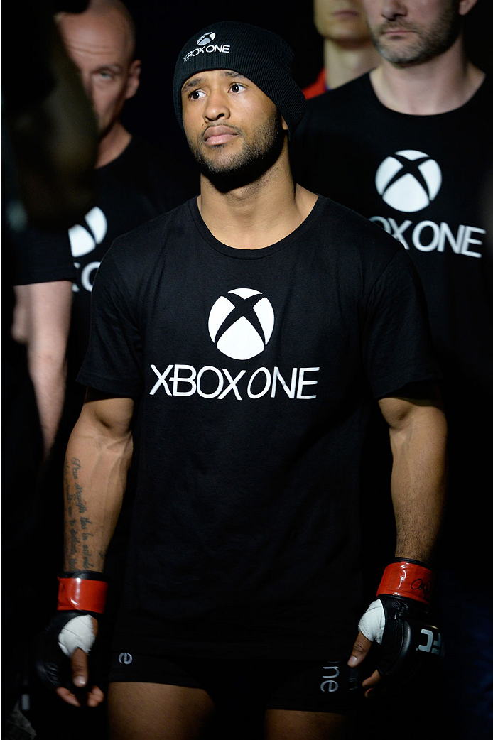 VANCOUVER, BC - JUNE 14: UFC Flyweight Champion Demetrious 'Mighty Mouse' Johnson prepares for his walk-in before his flyweight championship bout against Ali Bagautinov during the UFC 174 event at Rogers Arena on June 14, 2014 in Vancouver, British Colum