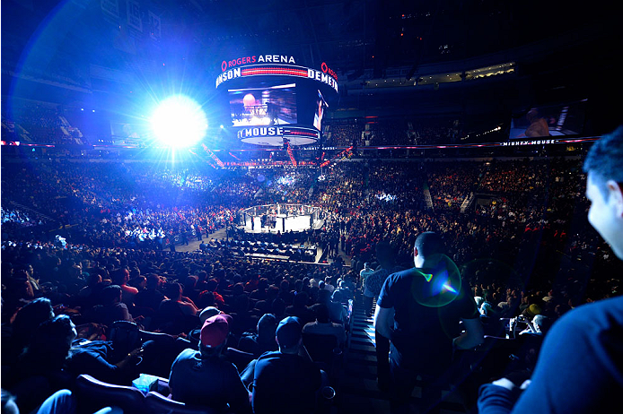 VANCOUVER, BC - JUNE 14: A general view of Demetrious 'Mighty Mouse' Johnson entering the Octagon before his championship bout against Ali Bagautinov during the UFC 174 event at Rogers Arena on June 14, 2014 in Vancouver, British Columbia, Canada. (Photo