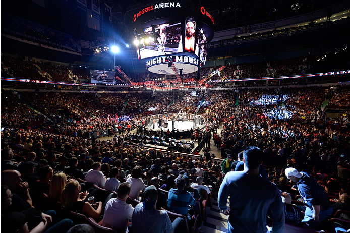 VANCOUVER, BC - JUNE 14: A general view of Demetrious 'Mighty Mouse' Johnson entering the Octagon before his championship bout against Ali Bagautinov during the UFC 174 event at Rogers Arena on June 14, 2014 in Vancouver, British Columbia, Canada. (Photo