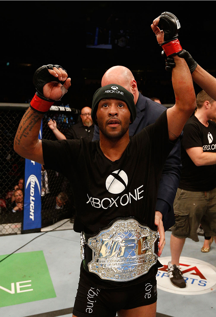 VANCOUVER, BC - JUNE 14: Demetrious "Mighty Mouse" Johnson reacts after his unanimous decision victory over Ali Bagautinov in their UFC flyweight championship bout at Rogers Arena on June 14, 2014 in Vancouver, Canada. (Photo by Josh Hedges/Zuffa LLC/Zu