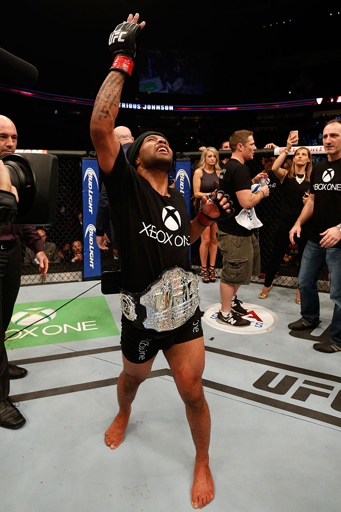 VANCOUVER, BC - JUNE 14: Demetrious "Mighty Mouse" Johnson reacts after his unanimous decision victory over Ali Bagautinov in their UFC flyweight championship bout at Rogers Arena on June 14, 2014 in Vancouver, Canada. (Photo by Josh Hedges/Zuffa LLC/Zu
