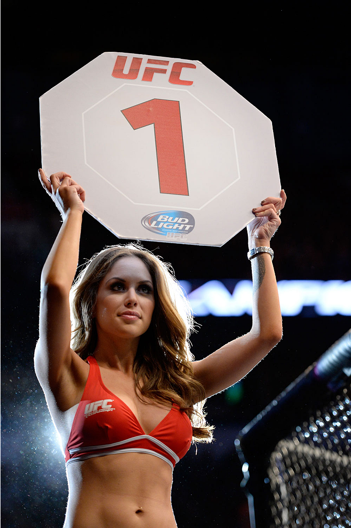 VANCOUVER, BC - JUNE 14: UFC Octagon Girl Britney Palmer signals the start of round one between Valerie Latourneau and Elizabeth Phillips during the UFC 174 event at Rogers Arena on June 14, 2014 in Vancouver, British Columbia, Canada. (Photo by Jeff Bot