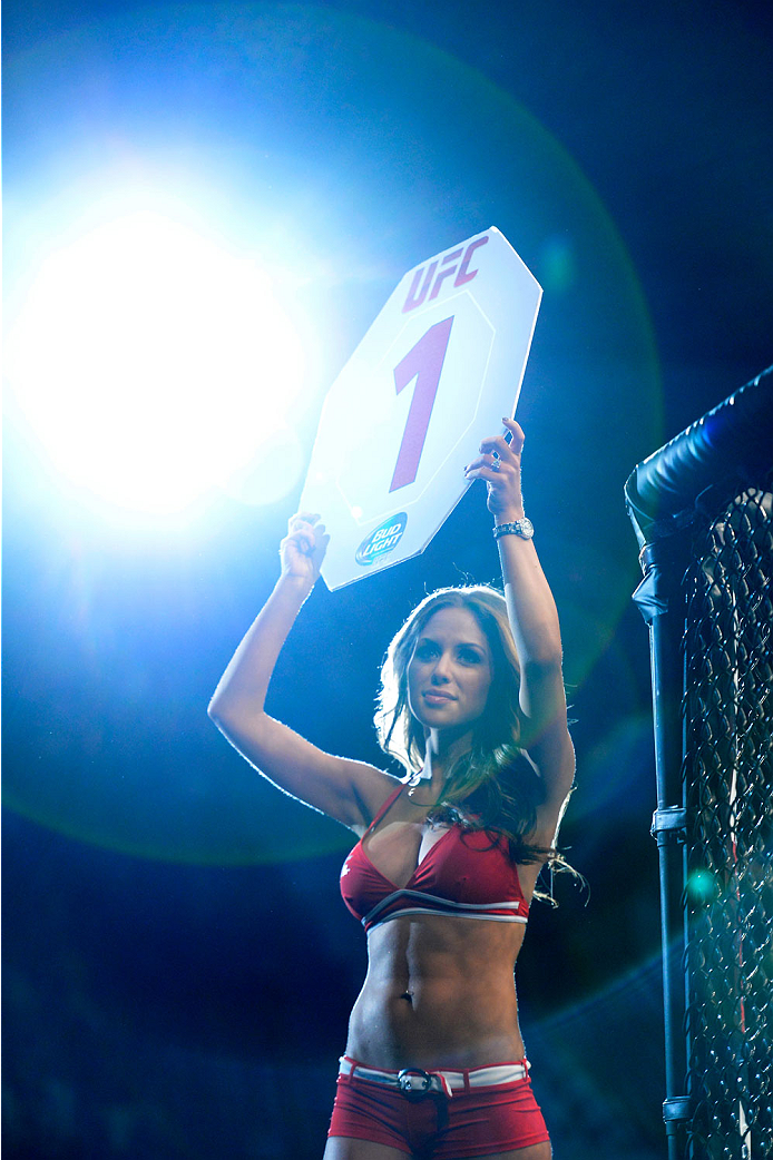 VANCOUVER, BC - JUNE 14: UFC Octagon Girl Britney Palmer signals the start of round one between Valerie Latourneau and Elizabeth Phillips during the UFC 174 event at Rogers Arena on June 14, 2014 in Vancouver, British Columbia, Canada. (Photo by Jeff Bot