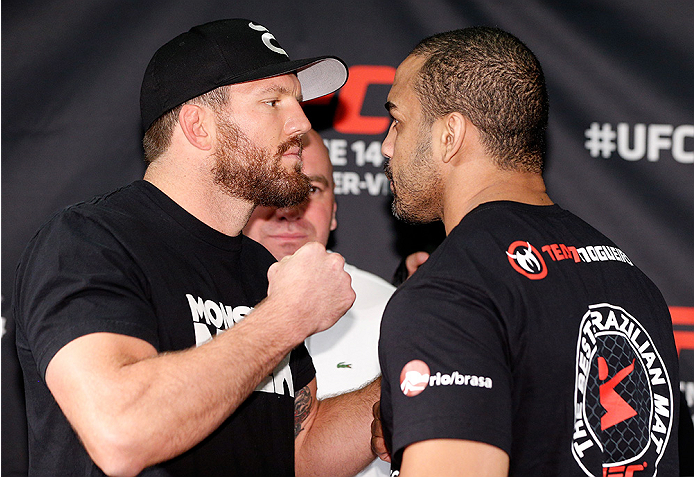 VANCOUVER, CANADA - JUNE 12: (L-R) Opponents Ryan Bader and Rafael "Feijao" Cavalcante face off at the EA Sports Capture Lab on June 12, 2014 in Vancouver, British Columbia, Canada. (Photo by Josh Hedges/Zuffa LLC/Zuffa LLC via Getty Images)