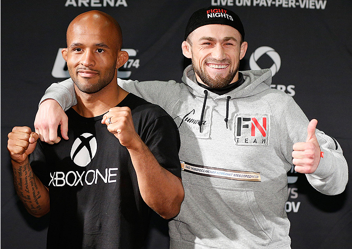 VANCOUVER, CANADA - JUNE 12: (L-R) Opponents Demetrious Johnson and Ali Bagautinov pose for photos at the EA Sports Capture Lab on June 12, 2014 in Vancouver, British Columbia, Canada. (Photo by Josh Hedges/Zuffa LLC/Zuffa LLC via Getty Images)