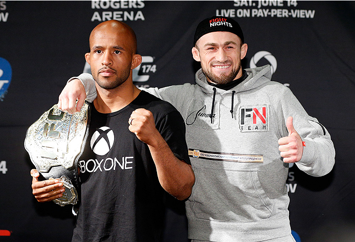 VANCOUVER, CANADA - JUNE 12: (L-R) Opponents Demetrious Johnson and Ali Bagautinov pose for photos at the EA Sports Capture Lab on June 12, 2014 in Vancouver, British Columbia, Canada. (Photo by Josh Hedges/Zuffa LLC/Zuffa LLC via Getty Images)