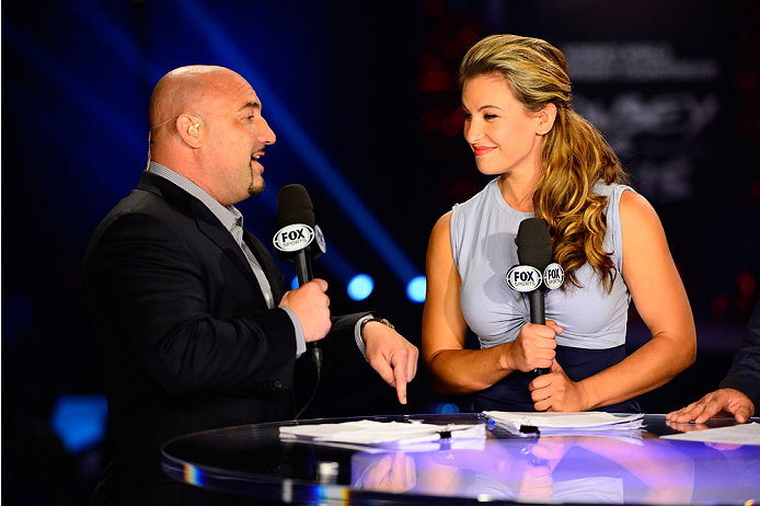 LAS VEGAS, NV - JULY 4: Sports broadcaster Jay Glazer interacts with mixed martial artist Miesha Tate at the FOX television desk during the UFC 175 weigh-in inside the Mandalay Bay Events Center on July 4, 2014 in Las Vegas, Nevada. (Photo by Jeff Bottar
