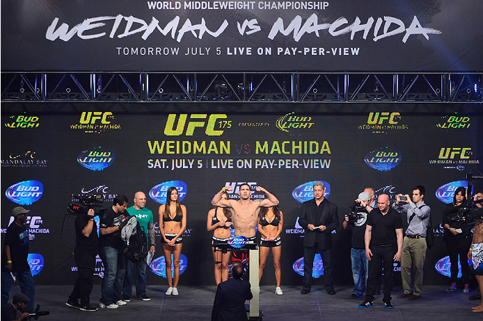 LAS VEGAS, NV - JULY 4: UFC Middleweight Champion Chris Weidman steps on the scale during the UFC 175 weigh-in inside the Mandalay Bay Events Center on July 4, 2014 in Las Vegas, Nevada. (Photo by Jeff Bottari/Zuffa LLC/Zuffa LLC via Getty Images)