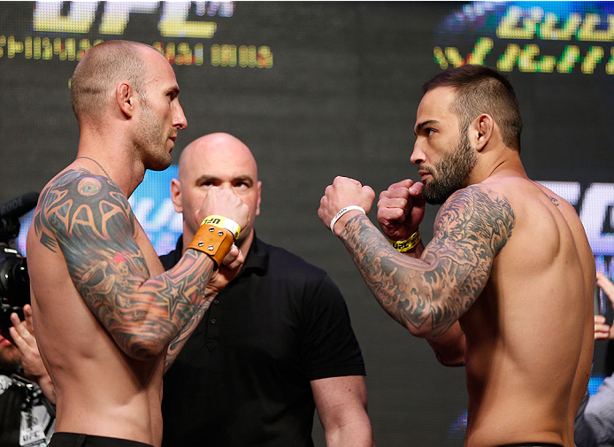 LAS VEGAS, NV - JULY 04: (L-R) Luke Zachrich faces off with Guilherme Vasconcelos during the UFC 175 weigh-in inside the Mandalay Bay Events Center on July 4, 2014 in Las Vegas, Nevada. (Photo by Josh Hedges/Zuffa LLC/Zuffa LLC via Getty Images)