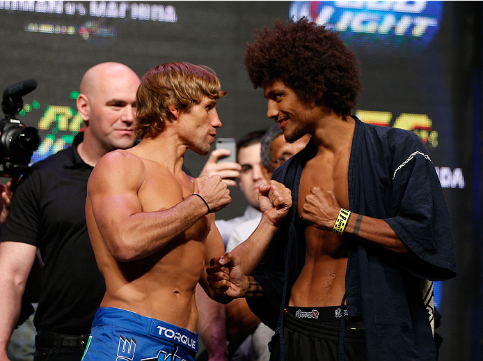 LAS VEGAS, NV - JULY 04: (L-R) Urijah Faber faces off with Alex Caceres during the UFC 175 weigh-in inside the Mandalay Bay Events Center on July 4, 2014 in Las Vegas, Nevada. (Photo by Josh Hedges/Zuffa LLC/Zuffa LLC via Getty Images)