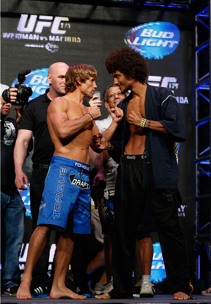 LAS VEGAS, NV - JULY 04: (L-R) Urijah Faber faces off with Alex Caceres during the UFC 175 weigh-in inside the Mandalay Bay Events Center on July 4, 2014 in Las Vegas, Nevada. (Photo by Josh Hedges/Zuffa LLC/Zuffa LLC via Getty Images)