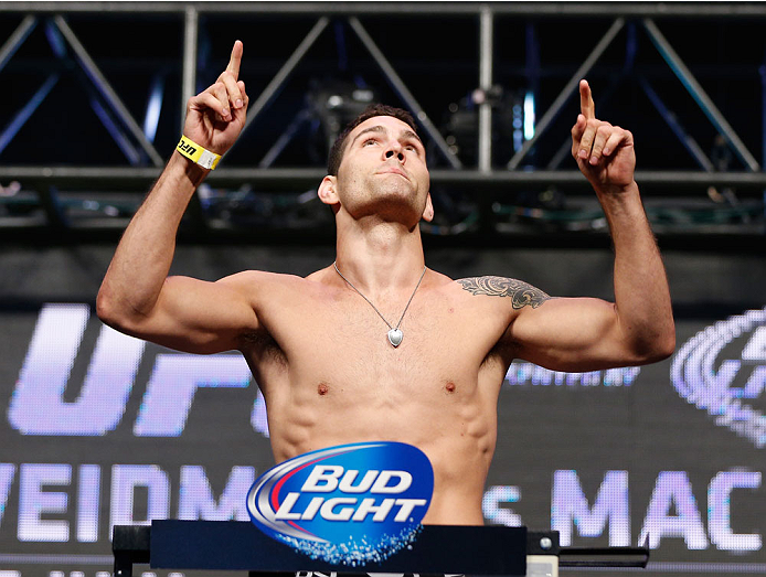 LAS VEGAS, NV - JULY 04: UFC Middleweight Champion Chris Weidman weighs in during the UFC 175 weigh-in inside the Mandalay Bay Events Center on July 4, 2014 in Las Vegas, Nevada. (Photo by Josh Hedges/Zuffa LLC/Zuffa LLC via Getty Images)
