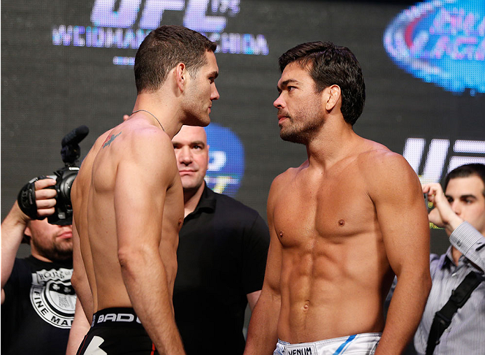 LAS VEGAS, NV - JULY 04: (L-R) UFC Middleweight Champion Chris Weidman faces off with Lyoto Machida during the UFC 175 weigh-in inside the Mandalay Bay Events Center on July 4, 2014 in Las Vegas, Nevada. (Photo by Josh Hedges/Zuffa LLC/Zuffa LLC via Get