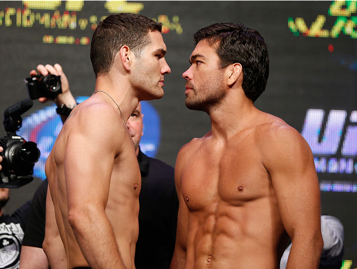 LAS VEGAS, NV - JULY 04: (L-R) UFC Middleweight Champion Chris Weidman faces off with Lyoto Machida during the UFC 175 weigh-in inside the Mandalay Bay Events Center on July 4, 2014 in Las Vegas, Nevada. (Photo by Josh Hedges/Zuffa LLC/Zuffa LLC via Get