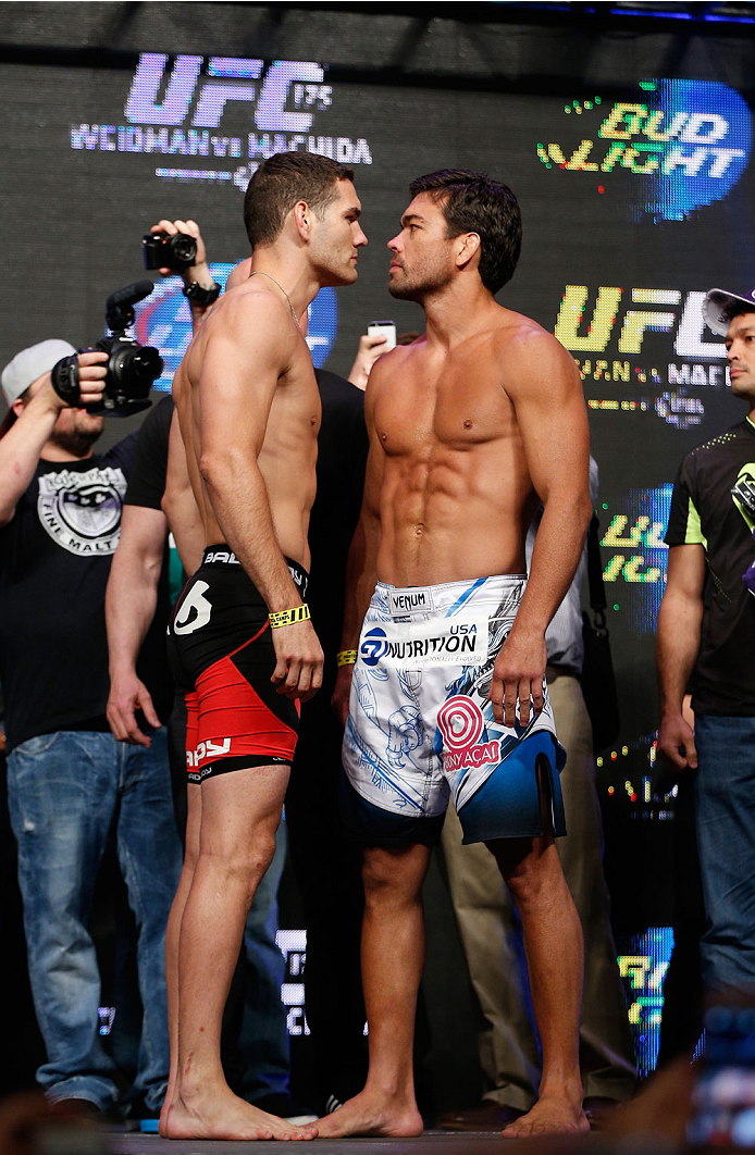 LAS VEGAS, NV - JULY 04: (L-R) UFC Middleweight Champion Chris Weidman faces off with Lyoto Machida during the UFC 175 weigh-in inside the Mandalay Bay Events Center on July 4, 2014 in Las Vegas, Nevada. (Photo by Josh Hedges/Zuffa LLC/Zuffa LLC via Get