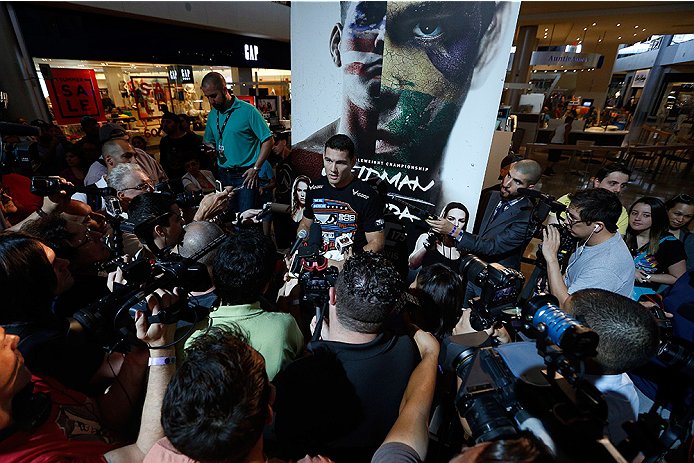 LAS VEGAS, NV - JULY 02: UFC middleweight champion Chris Weidman interacts with media after an open training session ahead of UFC 175 at the Fashion Show Mall on July 2, 2014 in Las Vegas, Nevada. (Photo by Josh Hedges/Zuffa LLC/Zuffa LLC via Getty Imag