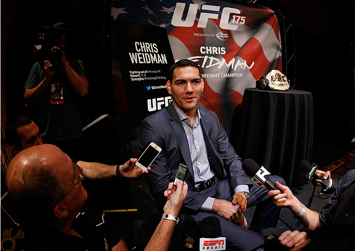 LAS VEGAS, NV - JULY 03: UFC middleweight champion Chris Weidman interacts with media during the UFC Ultimate Media Day at the Mandalay Bay Resort and Casino on July 3, 2014 in Las Vegas, Nevada. (Photo by Josh Hedges/Zuffa LLC/Zuffa LLC via Getty Image