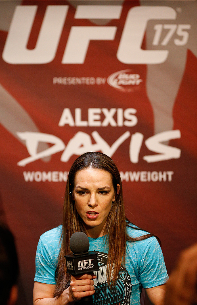 LAS VEGAS, NV - JULY 03: UFC women's bantamweight title challenger Alexis Davis interacts with media during the UFC Ultimate Media Day at the Mandalay Bay Resort and Casino on July 3, 2014 in Las Vegas, Nevada. (Photo by Josh Hedges/Zuffa LLC/Zuffa LLC