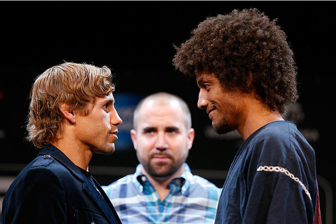 LAS VEGAS, NV - JULY 03: (L-R) Opponents Urijah Faber and Alex Caceres face off during the UFC Ultimate Media Day at the Mandalay Bay Resort and Casino on July 3, 2014 in Las Vegas, Nevada. (Photo by Josh Hedges/Zuffa LLC/Zuffa LLC via Getty Images)