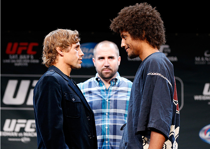 LAS VEGAS, NV - JULY 03: (L-R) Opponents Urijah Faber and Alex Caceres face off during the UFC Ultimate Media Day at the Mandalay Bay Resort and Casino on July 3, 2014 in Las Vegas, Nevada. (Photo by Josh Hedges/Zuffa LLC/Zuffa LLC via Getty Images)
