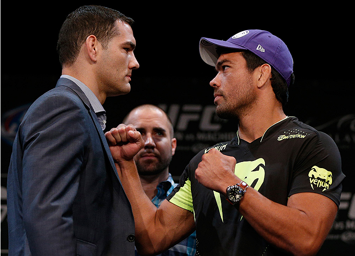 LAS VEGAS, NV - JULY 03: (L-R) Opponents Chris Weidman and Lyoto Machida face off during the UFC Ultimate Media Day at the Mandalay Bay Resort and Casino on July 3, 2014 in Las Vegas, Nevada. (Photo by Josh Hedges/Zuffa LLC/Zuffa LLC via Getty Images)