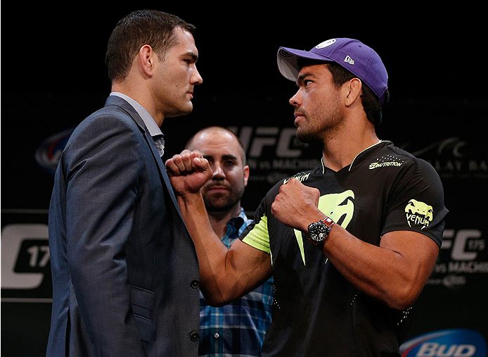 LAS VEGAS, NV - JULY 03: (L-R) Opponents Chris Weidman and Lyoto Machida face off during the UFC Ultimate Media Day at the Mandalay Bay Resort and Casino on July 3, 2014 in Las Vegas, Nevada. (Photo by Josh Hedges/Zuffa LLC/Zuffa LLC via Getty Images)