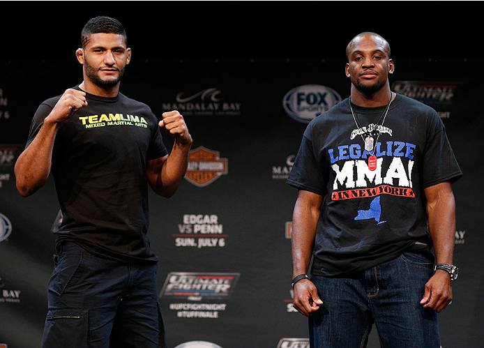 LAS VEGAS, NV - JULY 03: (L-R) Opponents Dhiego Lima and Eddie Gordon pose for photos during the UFC Ultimate Media Day at the Mandalay Bay Resort and Casino on July 3, 2014 in Las Vegas, Nevada. (Photo by Josh Hedges/Zuffa LLC/Zuffa LLC via Getty Image