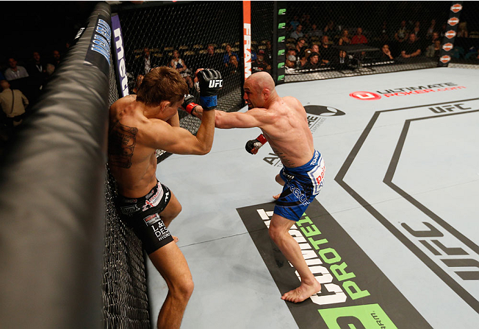 LAS VEGAS, NV - SEPTEMBER 27: Manval Gamburyan punches Cody Gibson in their bantamweight fight during the UFC 178 event inside the MGM Grand Garden Arena on September 27, 2014 in Las Vegas, Nevada. (Photo by Josh Hedges/Zuffa LLC/Zuffa LLC via Getty Ima