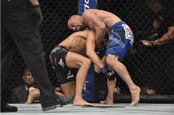 LAS VEGAS, NV - SEPTEMBER 27: Manval Gamburyan chokes Cody Gibson in their bantamweight fight during the UFC 178 event inside the MGM Grand Garden Arena on September 27, 2014 in Las Vegas, Nevada. (Photo by Jeff Bottari/Zuffa LLC/Zuffa LLC via Getty Ima