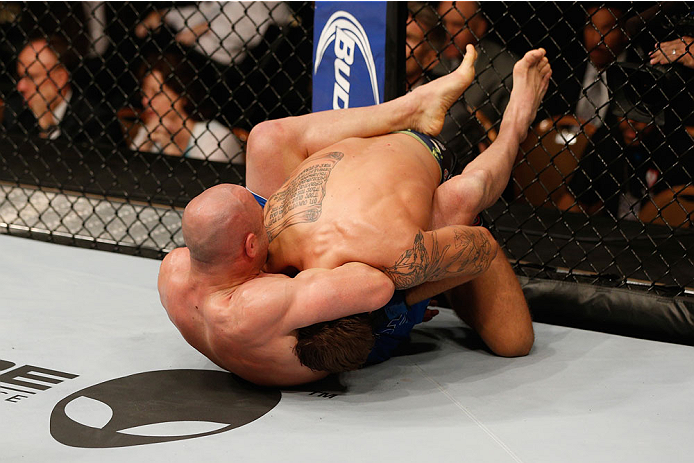 LAS VEGAS, NV - SEPTEMBER 27: Manval Gamburyan attempts to submit Cody Gibson in their bantamweight fight during the UFC 178 event inside the MGM Grand Garden Arena on September 27, 2014 in Las Vegas, Nevada. (Photo by Josh Hedges/Zuffa LLC/Zuffa LLC vi