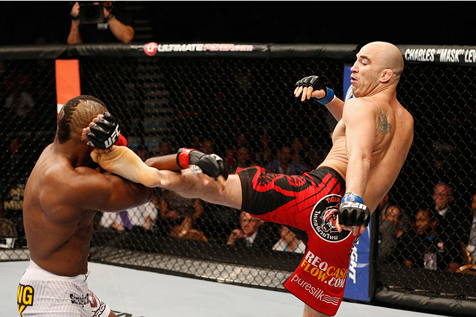 LAS VEGAS, NV - SEPTEMBER 27: (R-L) Brian Ebersole kicks John Howard in their welterweight fight during the UFC 178 event inside the MGM Grand Garden Arena on September 27, 2014 in Las Vegas, Nevada. (Photo by Josh Hedges/Zuffa LLC/Zuffa LLC via Getty I