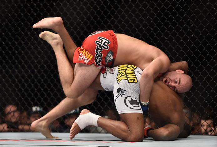 LAS VEGAS, NV - SEPTEMBER 27: (Top) Brian Ebersole grapples with John Howard in their welterweight fight during the UFC 178 event inside the MGM Grand Garden Arena on September 27, 2014 in Las Vegas, Nevada. (Photo by Jeff Bottari/Zuffa LLC/Zuffa LLC vi