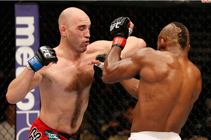 LAS VEGAS, NV - SEPTEMBER 27: (L-R) Brian Ebersole elbows John Howard n their welterweight fight during the UFC 178 event inside the MGM Grand Garden Arena on September 27, 2014 in Las Vegas, Nevada. (Photo by Josh Hedges/Zuffa LLC/Zuffa LLC via Getty I