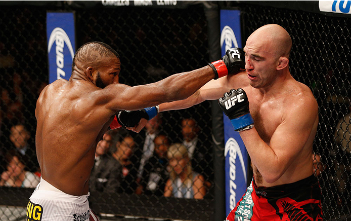 LAS VEGAS, NV - SEPTEMBER 27: (L-R) John Howard and Brian Ebersole exchange punches in their welterweight fight during the UFC 178 event inside the MGM Grand Garden Arena on September 27, 2014 in Las Vegas, Nevada. (Photo by Josh Hedges/Zuffa LLC/Zuffa