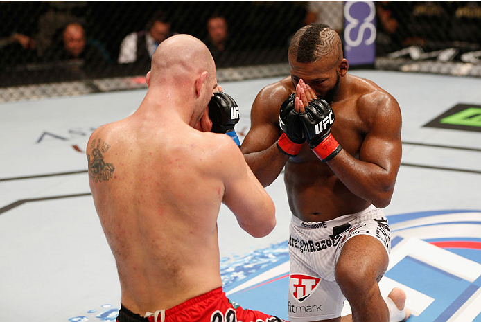 LAS VEGAS, NV - SEPTEMBER 27: (L-R) Brian Ebersole and John Howard show respect towards each other after their welterweight fight during the UFC 178 event inside the MGM Grand Garden Arena on September 27, 2014 in Las Vegas, Nevada. (Photo by Josh Hedge