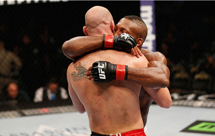 LAS VEGAS, NV - SEPTEMBER 27: (L-R) Brian Ebersole and John Howard embrace after their welterweight fight during the UFC 178 event inside the MGM Grand Garden Arena on September 27, 2014 in Las Vegas, Nevada. (Photo by Josh Hedges/Zuffa LLC/Zuffa LLC vi