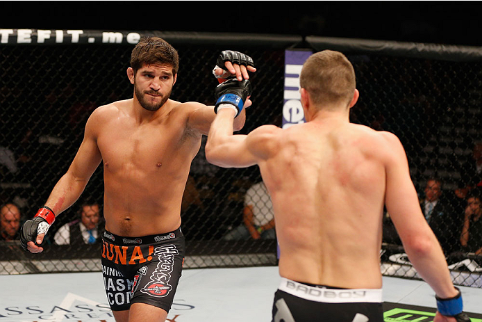 LAS VEGAS, NV - SEPTEMBER 27: (L-R) Patrick Cote and Stephen Thompson begin Round 2 in their welterweight fight during the UFC 178 event inside the MGM Grand Garden Arena on September 27, 2014 in Las Vegas, Nevada. (Photo by Josh Hedges/Zuffa LLC/Zuffa