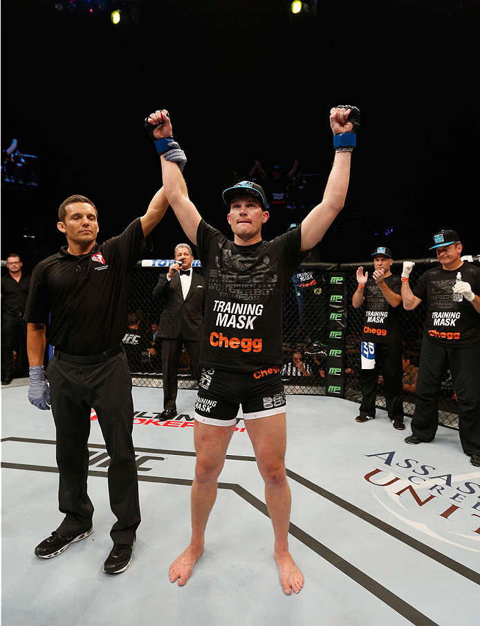 LAS VEGAS, NV - SEPTEMBER 27: Josh Thompson celebrates his victory over Patrick Cote in their welterweight fight during the UFC 178 event inside the MGM Grand Garden Arena on September 27, 2014 in Las Vegas, Nevada. (Photo by Josh Hedges/Zuffa LLC/Zuffa
