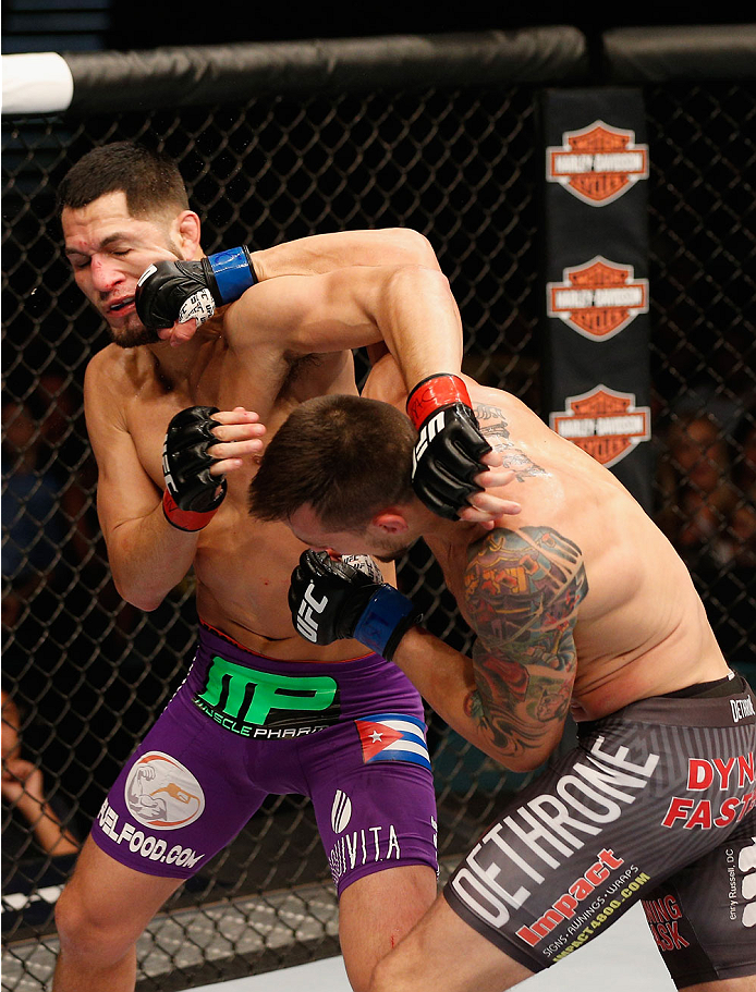 LAS VEGAS, NV - SEPTEMBER 27: (R-L) James Krause punches Jorge Masvidal in their lightweight fight during the UFC 178 event inside the MGM Grand Garden Arena on September 27, 2014 in Las Vegas, Nevada. (Photo by Josh Hedges/Zuffa LLC/Zuffa LLC via Getty