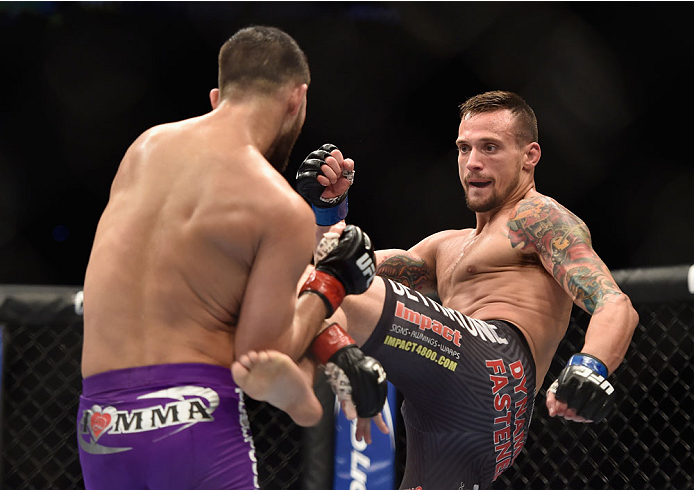 LAS VEGAS, NV - SEPTEMBER 27: (R-L) James Krause kicks Jorge Masvidal in their lightweight fight during the UFC 178 event inside the MGM Grand Garden Arena on September 27, 2014 in Las Vegas, Nevada. (Photo by Jeff Bottari/Zuffa LLC/Zuffa LLC via Getty